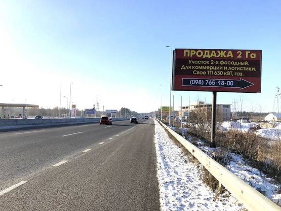 Фото рекламної площини за адресою В.Почтовая, a/д М-05 Киев-Одесса , после АЗС AMIC ENERGY