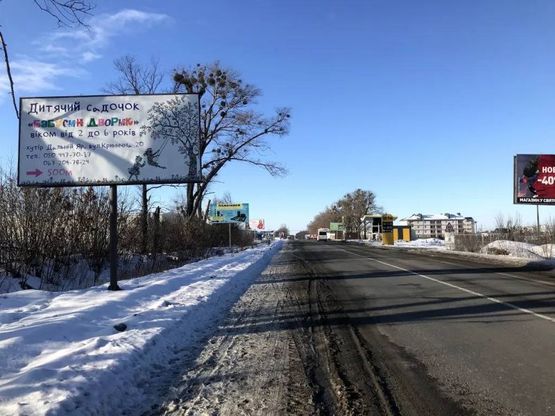 Фото рекламной плоскости по адресу А-д P04 , после магазина "Парирус"