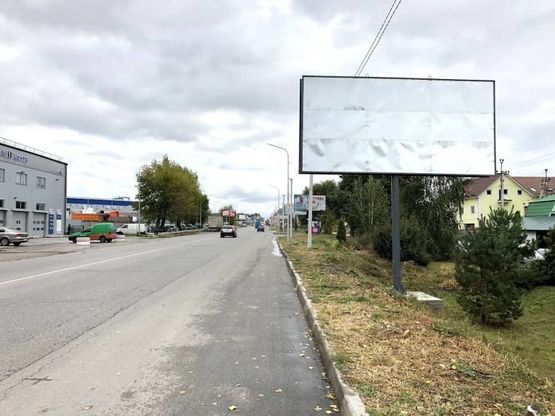 Фото рекламной плоскости по адресу ул. Белогородская , Перед поворотом на ул. Виноградная