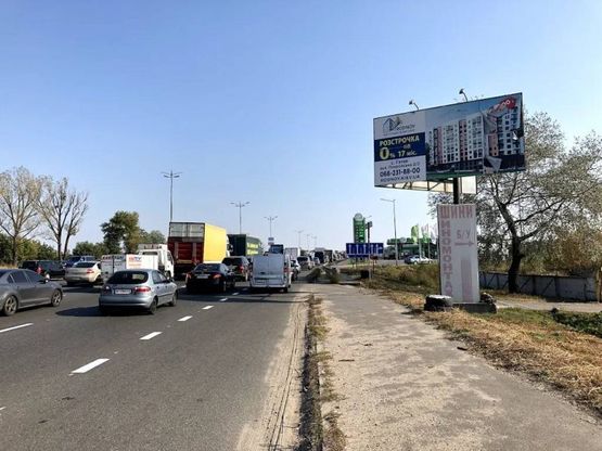 Фото рекламной плоскости по адресу Окружная дорога , перез АЗС "UPG" , перед Жулянским мостом