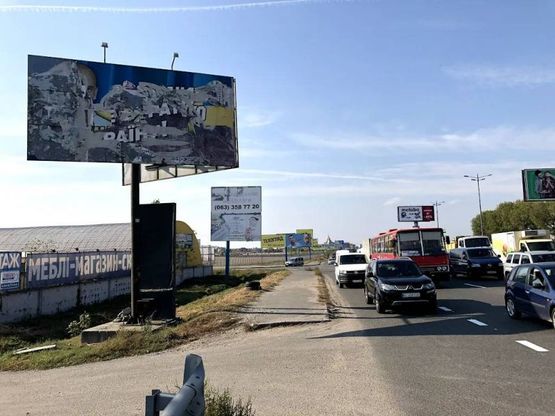 Фото рекламной плоскости по адресу Окружная дорога , перез АЗС "UPG" , перед Жулянским мостом
