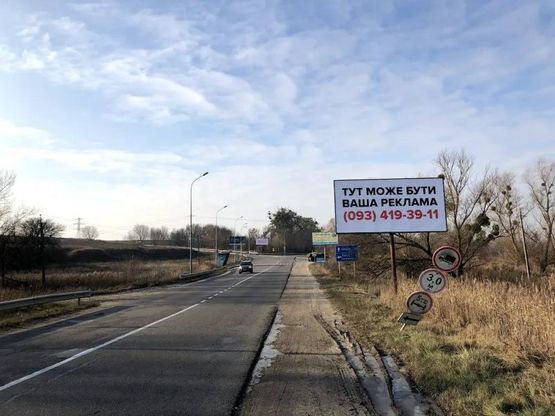Фото рекламної площини за адресою А/д Т1038