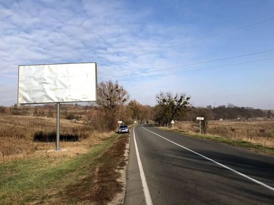 Фото рекламной плоскости по адресу А/д Т1038 , заезд в село