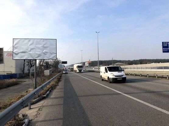 Фото рекламной плоскости по адресу А/д Е-40 , после перекрестка