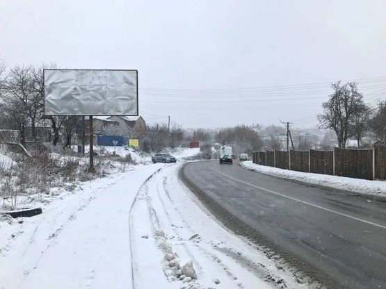 Фото рекламной плоскости по адресу Гатное , Ул. Жулянская , 22 , перед Сельсоветом