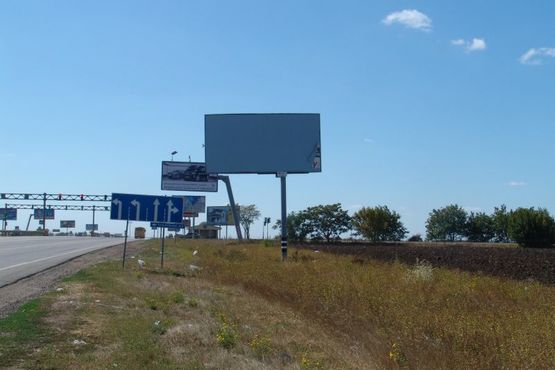 Фото рекламної площини за адресою 7 км. Овидиопольской дороги (9+950), перед повороротом на оптовый промрынок "7км" (на светофоре), движение из города, от "Эпицентра"