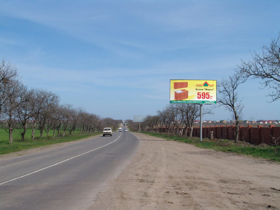 Фото рекламної площини за адресою Ильичевская дорога от Паромной переправы в Одессу, к оптовому стройрынку