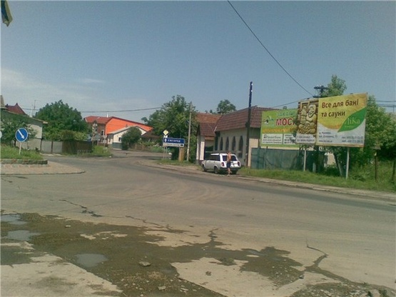 Фото рекламной плоскости по адресу м. Тячів перехрестя вул. Незалежності, Шапошнікова та площі Карла Маркса, напроти автобусної стоянки