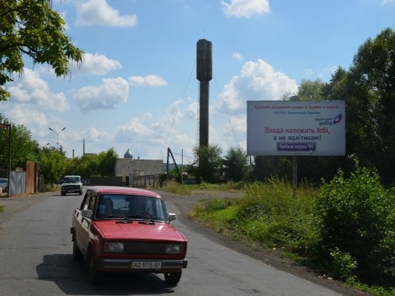 Фото рекламної площини за адресою Іршава біля заводу РЕВ станок та меблевого магазину вїзд