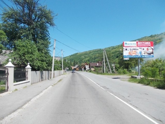 Фото рекламной плоскости по адресу Рахів вул.Головна,  виїзд з центра міста в сторону м.Ів.Франківськ