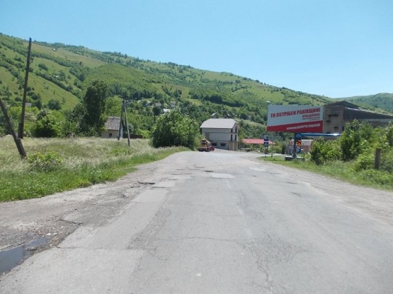 Фото рекламной плоскости по адресу Рахів вїзд  в місто зі сторони м.Ів.Франківськ