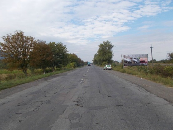 Фото рекламной плоскости по адресу м.Тячів, в'їзд в місто в сторону м.Ужгород, Мукачево, Хуст