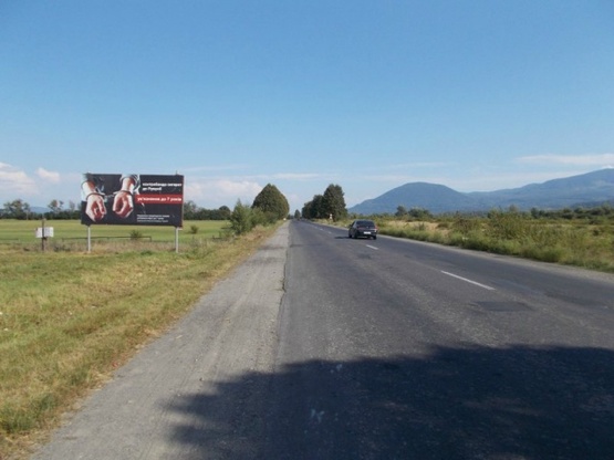 Фото рекламной плоскости по адресу смт.Буштино виїзд з селища в сторону  м. Тячів, Рахів