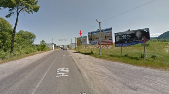 Фото рекламної площини за адресою м. Тячів вул.Незалежності, АЗС "WOG", бізнес-центр, навпроти  Автосалонів в сторону м.Рахів