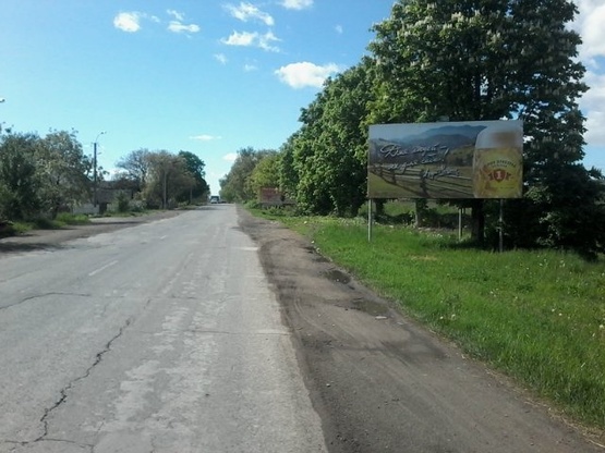 Фото рекламної площини за адресою смт.Тересва,вул.Народна (Леніна ) в сторону м.Тячів