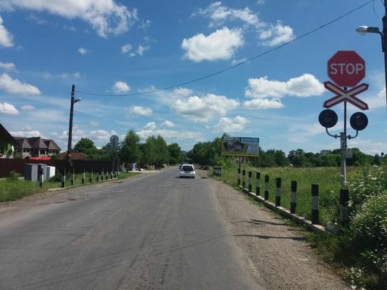Фото рекламної площини за адресою смт.Солотвино,вул.Спортивна, ( переїзд ) в сторону м.Рахів