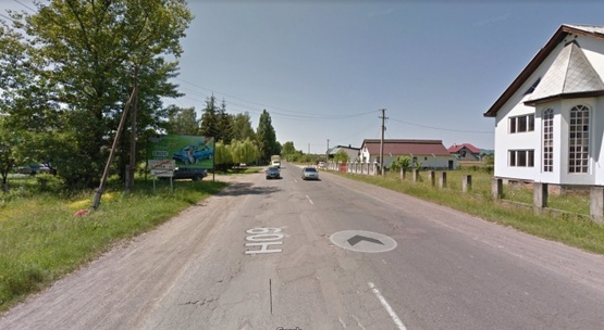 Фото рекламной плоскости по адресу смт.Солотвино,вул.Головна, в сторону м. Тячів, біля застави, траса Мукачево-Рогатин