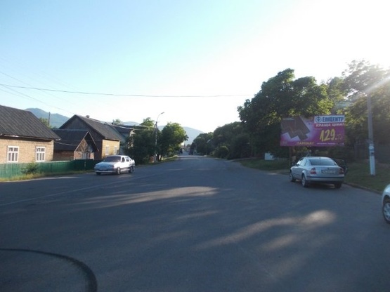 Фото рекламной плоскости по адресу смт. Тересва, вул. Головна в сторону м. Тячів