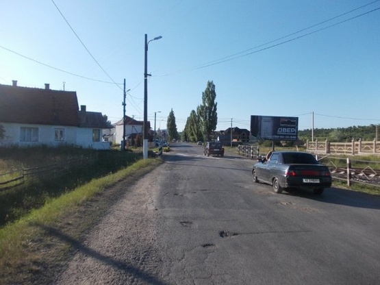 Фото рекламной плоскости по адресу с.Діброва, вул.Головна, в сторону м.Тячів