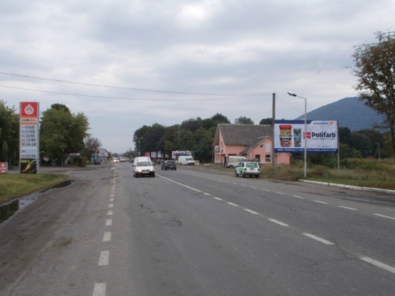 Фото рекламної площини за адресою м. Тячів вул. Армійська,  біля стадіону,  ресторан «Оксана» та автомийки Мукачево-Рогатин