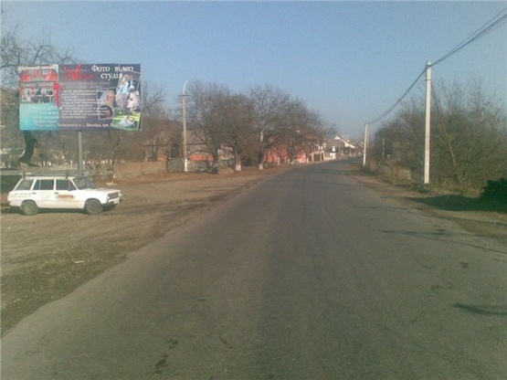 Фото рекламної площини за адресою с.Вільхівці, вул. Головна в сторону смт. Дубове зї сторони м.Тячів