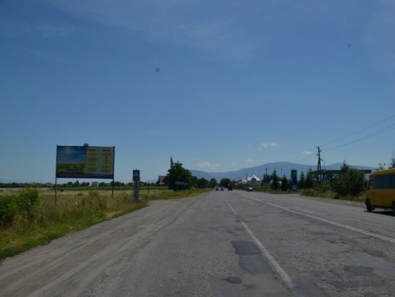Фото рекламной плоскости по адресу смт.Буштино вїзд в селище в сторону м.Тячів зі сторони м.Ужгород траса Мукачево-Рогатин