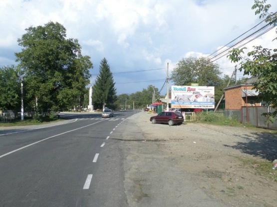 Фото рекламной плоскости по адресу с.Вільхівці, вул.Головна в сторну смт.Нересниця зі сторони м.Тячів