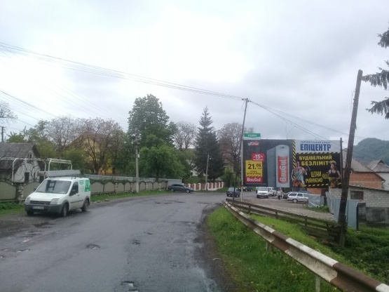 Фото рекламной плоскости по адресу с.Ганичі, вул.Головна центр села в сторну м.Тячів зі сторони смт.Нересниця