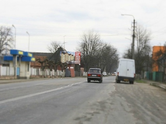 Фото рекламной плоскости по адресу м. Тячів вул.Армійська, вїзд в місто з сторони м.Хуст, Ужгород, біля стадіону