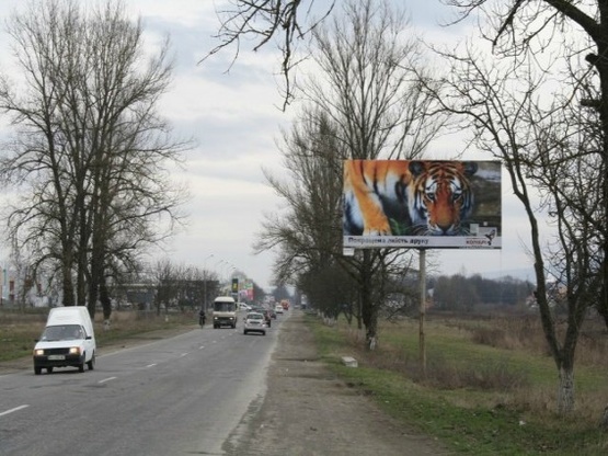 Фото рекламної площини за адресою В'їзд в м. Тячів, біля АЗС UPG, Маркет, супермаркету Барва  зі сторони м. Хуст, траса Мукачево-Рогатин