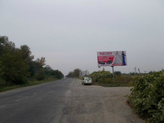 Фото рекламної площини за адресою вїзд 2км до м.Тячів. В сторону м.Ужгород, Мукачево, Хуст