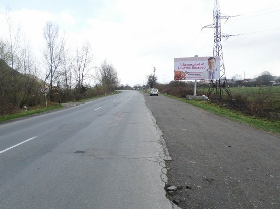 Фото рекламной плоскости по адресу м.Хуст обїзна дорога, в сторону м.Тячів,м.Міжгіря, трасса Мукачево- Рогатин