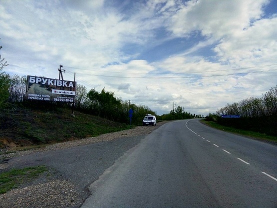 Фото рекламной плоскости по адресу м.Хуст, об'їздна міста,поворот на с.Н.Селище, (Долину_нарцисiв) траса Мукачево-Ів.Франківськ