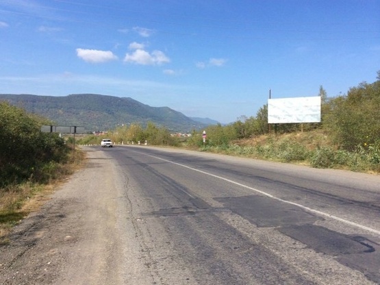 Фото рекламной плоскости по адресу м.Хуст, об'їздна міста,поворот на с.Н.Селище, (Долину_нарцисiв)в сторону м. Мукачево, траса  Ів.Франківськ-Мукачево