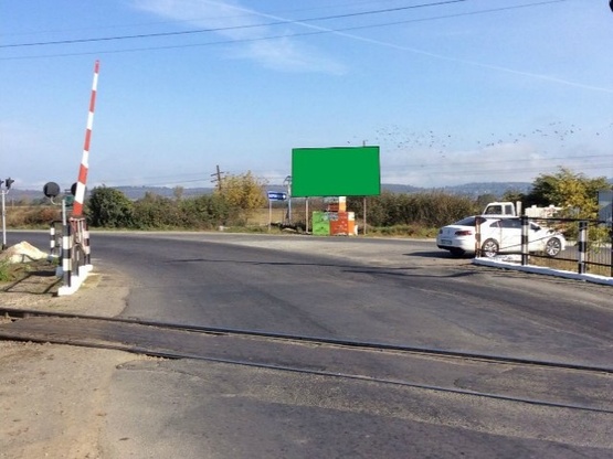 Фото рекламной плоскости по адресу Хустський район, поворот на с. Бороняво, переїзд, в сторону м. Ужгород траса  Івано-Франківськ-Ужгород.