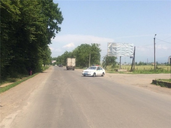 Фото рекламной плоскости по адресу м.Хуст,вул.Львівська, АЗС ОККО, Супермаркет, виїзд з міста, в  Міжгір'я