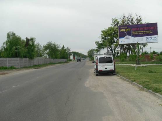 Фото рекламной плоскости по адресу вул. Дружби, біля вет корпусу БДАУ