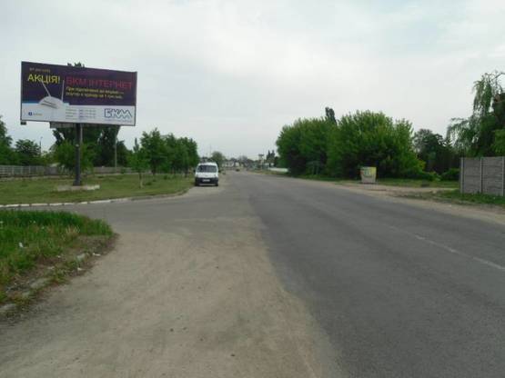 Фото рекламной плоскости по адресу вул. Дружби, біля вет корпусу БДАУ