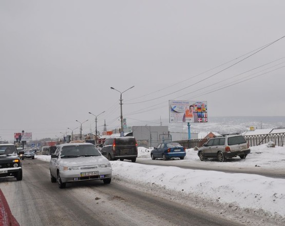 Фото рекламной плоскости по адресу вул. Калинівський ринок (розділова смуга)