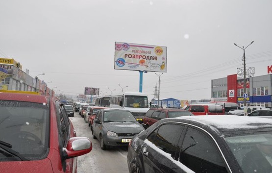 Фото рекламной плоскости по адресу вул. Калинівський ринок (розділова смуга)