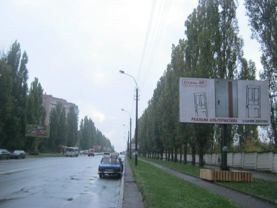 Фото рекламной плоскости по адресу м. Рівне вул. Шухевича 18, неподалік автозаправки “OKKO”.