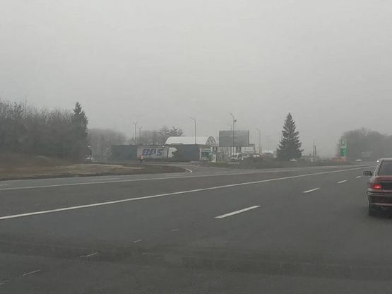 Фото рекламной плоскости по адресу Немирівська траса, АЗС ОККО