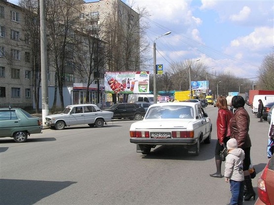 Фото рекламной плоскости по адресу Яновского.