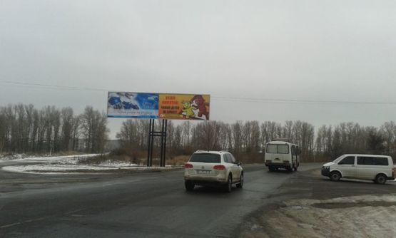 Фото рекламной плоскости по адресу ул.Суворова р-н АЗС(въезд в город со стороны г.Полтава и г.Комсомольск)