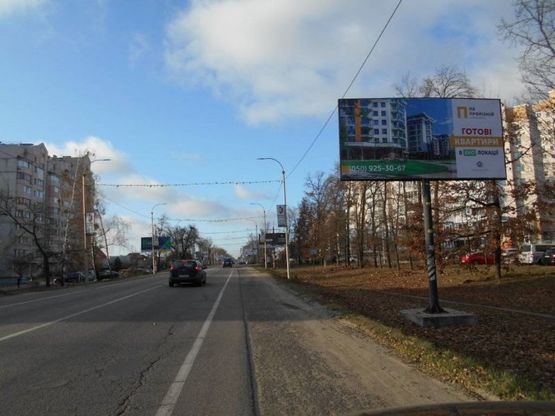 Фото рекламної площини за адресою м. Буча, траса М07, км 29+000 право, вул. Нове Шосе,16, напрямок ТЦ Модуль, Нова Лінія, ЕКО Маркет-Модуль