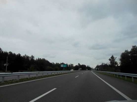 Фото рекламной плоскости по адресу Новообухівська траса, км 30+970 лево, 2 км от ресторана "Край-Рай", элитный частный сектор, возле с. Великі Дмитровичі