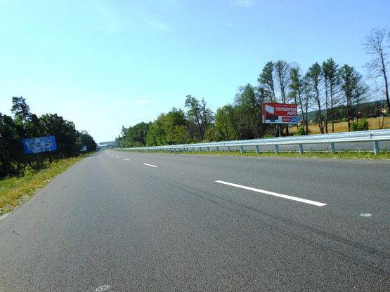 Фото рекламної площини за адресою Новообухівська траса, км 31+050 право, элитный частный сектор, возле с. Великі Дмитровичі, ресторан Абу-Даби