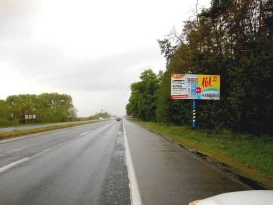 Фото рекламной плоскости по адресу Чернігівська траса, М-01, км 43+130 ліво, с. Залісся, вул. Київська, 300м до поворота на завод "Coca-Cola", АЗС "ОККО", 2 км до АЗС Лукойл