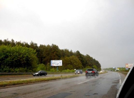 Фото рекламной плоскости по адресу м. Бровари, траса М-01, об'їзд м. Бровари, км 19+800 ліво, перед поворотом на ЖК "Скандія"