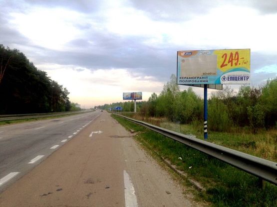 Фото рекламной плоскости по адресу м. Бровари, траса М-01, об'їзд м. Бровари, км 20+000 право, с. Княжичи, перед поворотом  ЖК "Скандія"